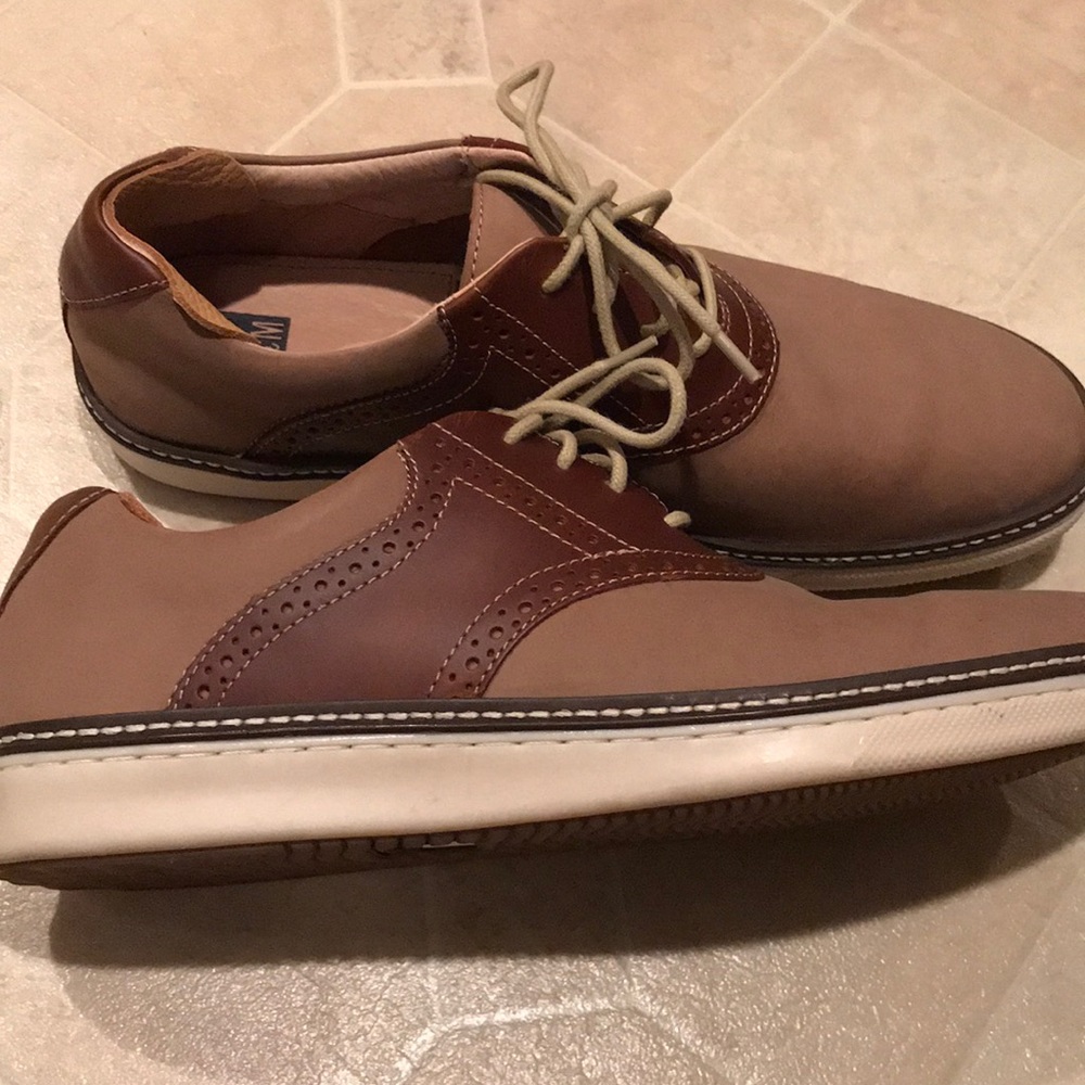 Men’s tan and brown dress shoes